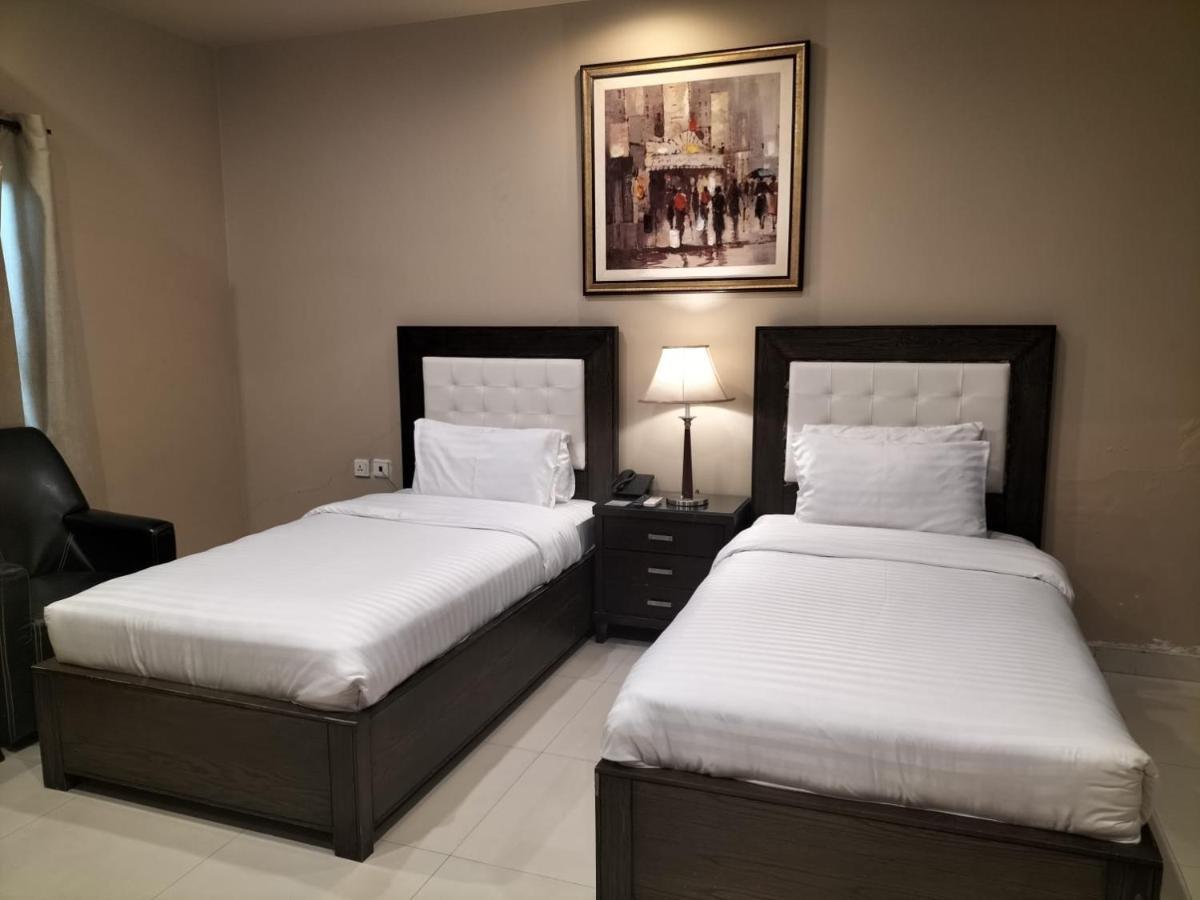 Grand Regent Hotel And Suites Faisalabad Exterior photo